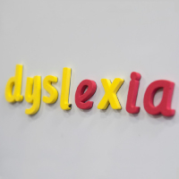 fridge magnet letters spelling 'dyslexia'